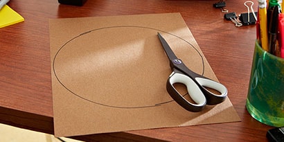 cut a circle about the size of a paper plate cut a circle about the size of a paper plate